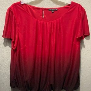 Short sleeve red glitter color tapering to black.
